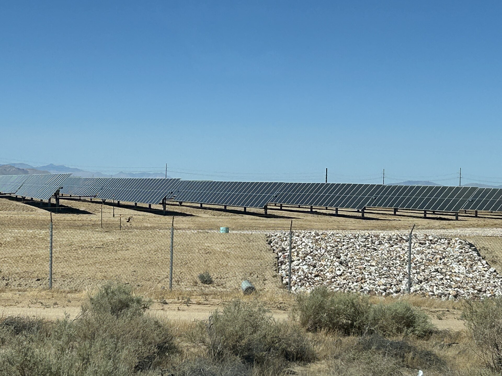 Solar panels on a farm illustrating solar-powered chicken coop door setups