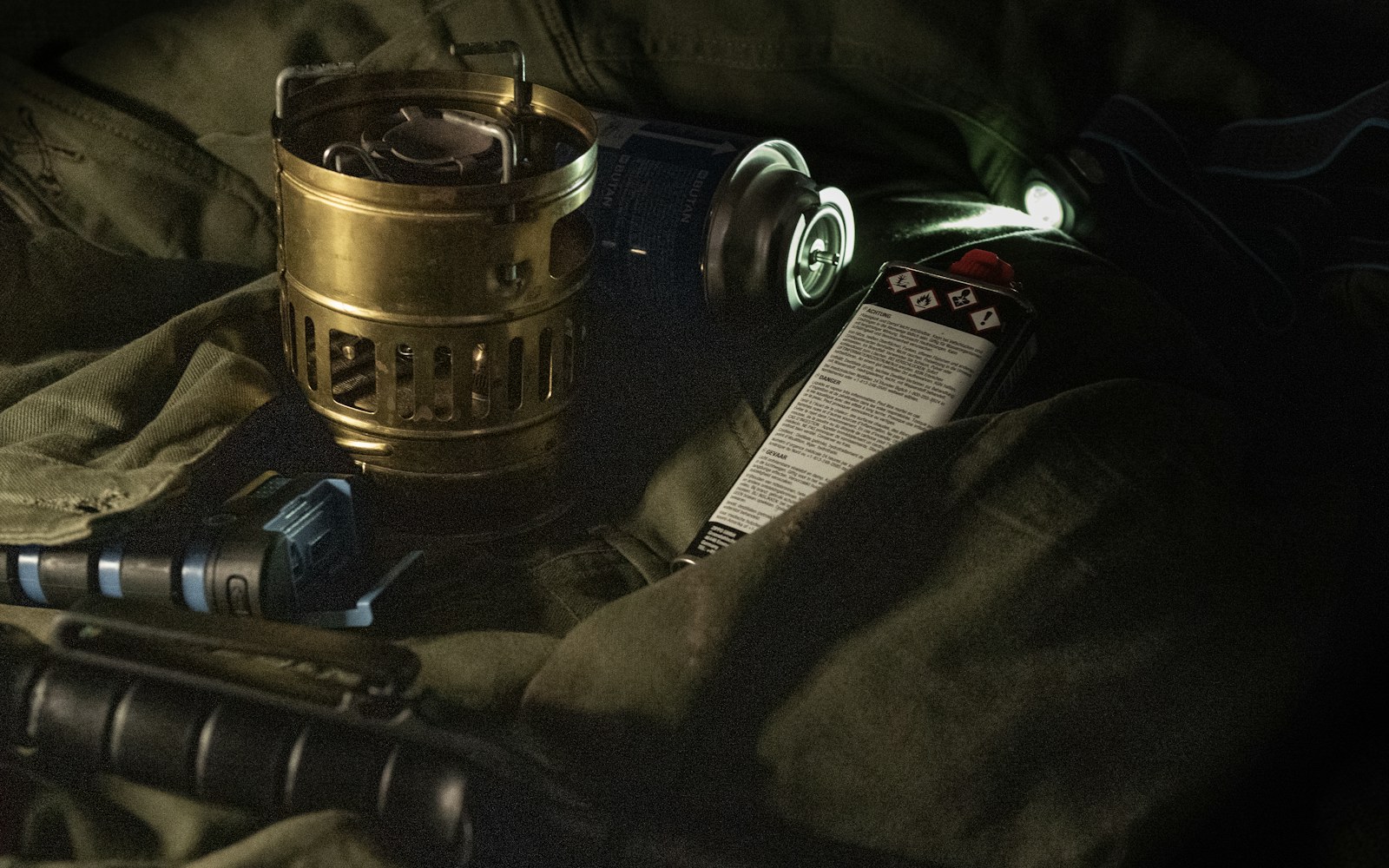 Flashlight and emergency gear prepared for a power outage