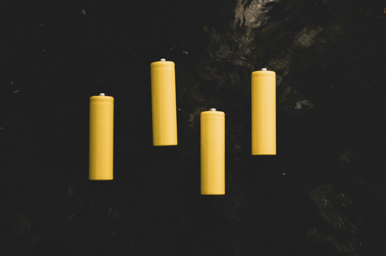 Four rechargeable AA batteries for illustrating battery compatibility