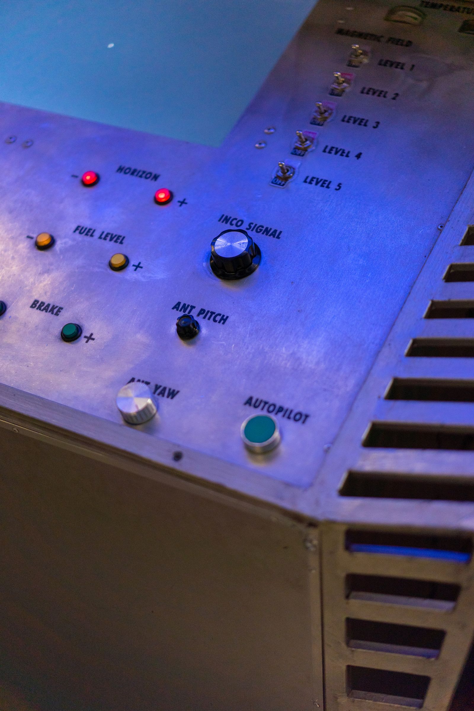 Electronic control panel with blue buttons