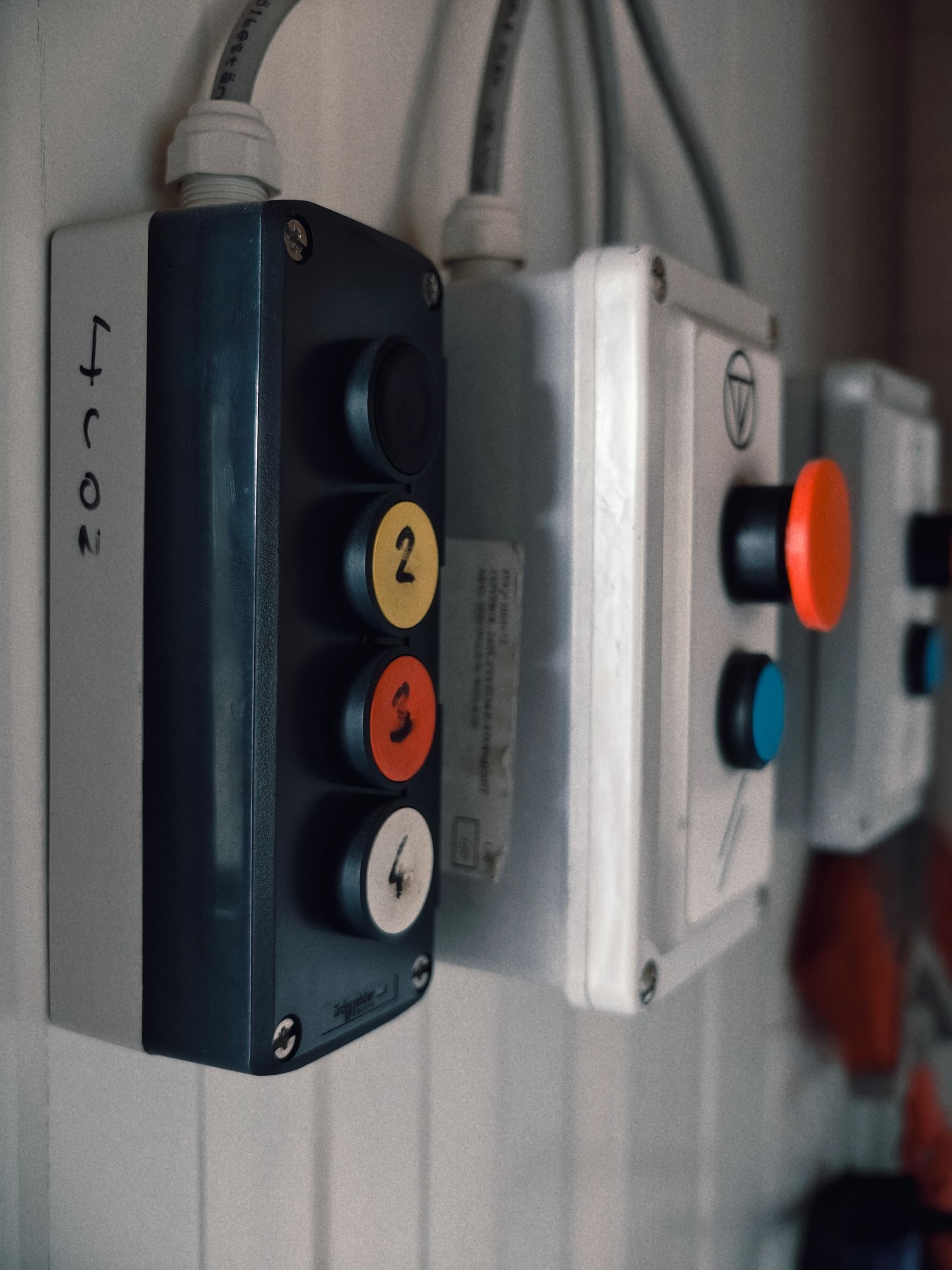 Industrial control panel with colored buttons